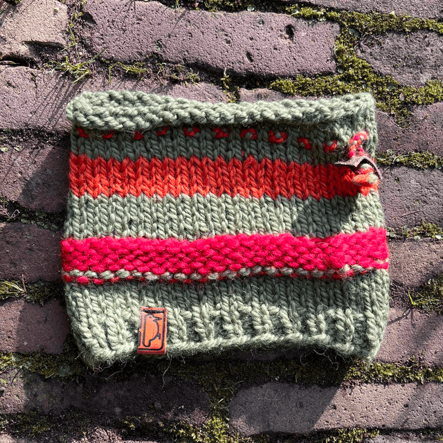 Groen-rood-oranje muts