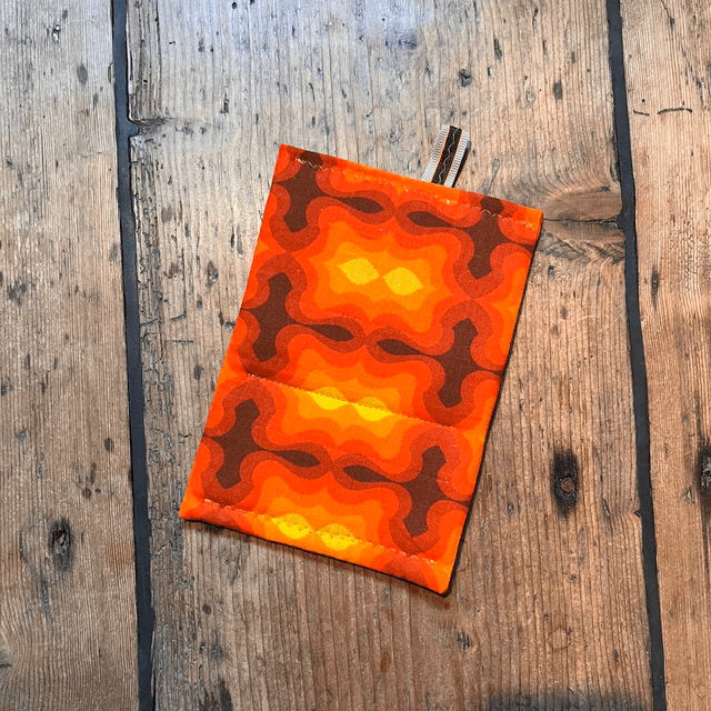 Oranje pannenlap