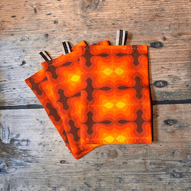 Oranje pannenlap
